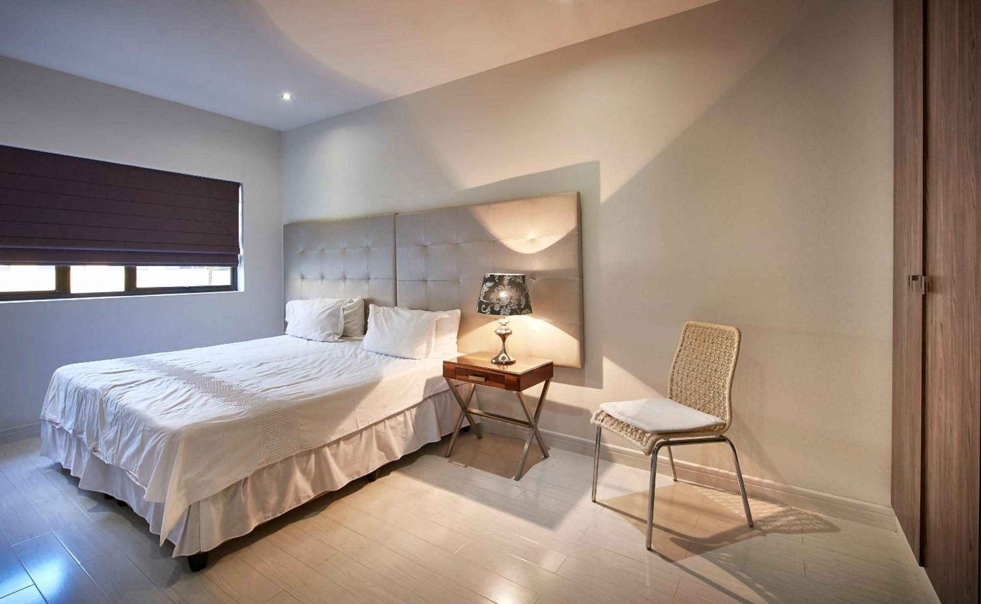 Dynasty Forest Sandown Serviced Apartments & Self Catering Hotel ヨハネスブルグ 部屋 写真
