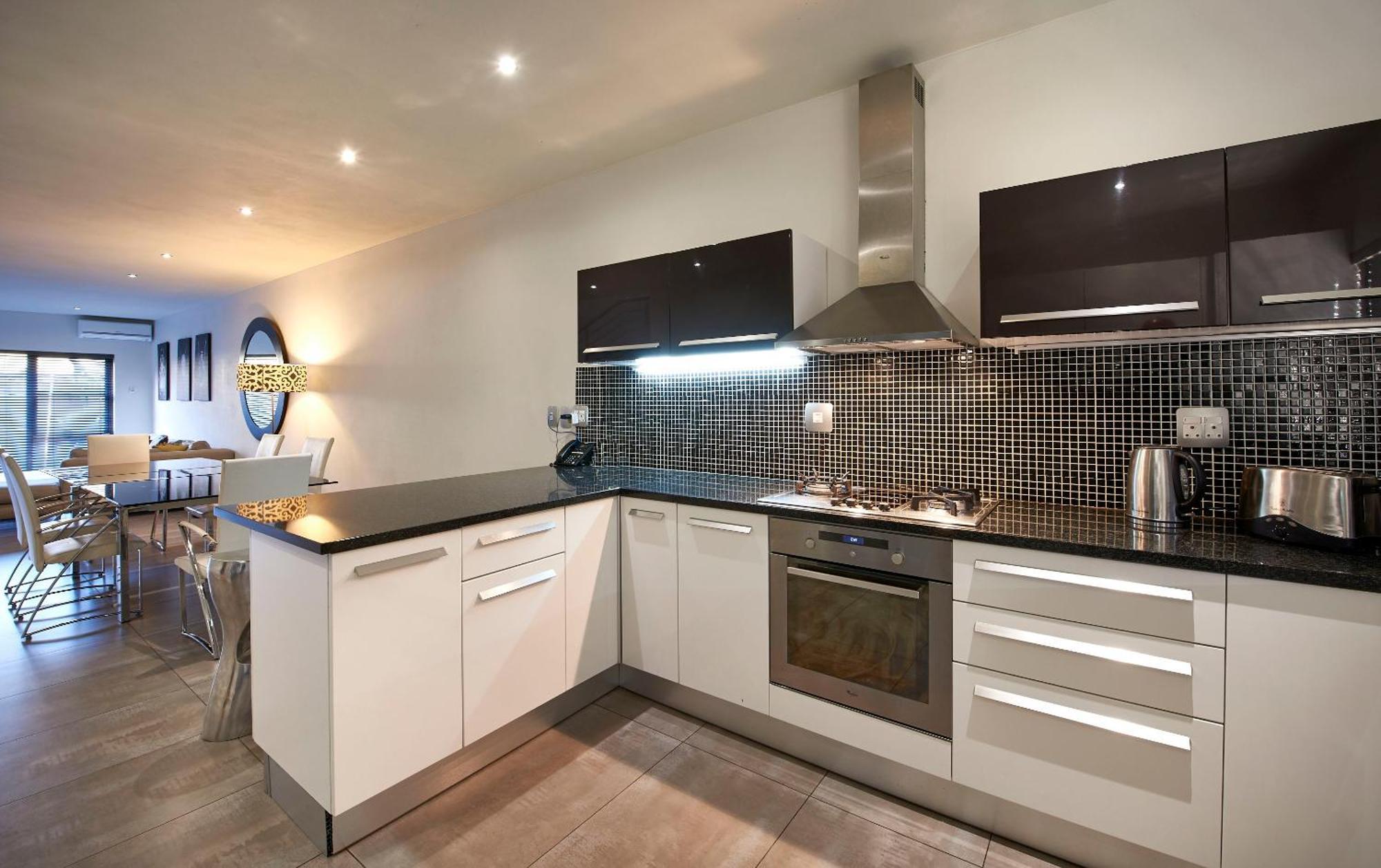 Dynasty Forest Sandown Serviced Apartments & Self Catering Hotel ヨハネスブルグ 部屋 写真