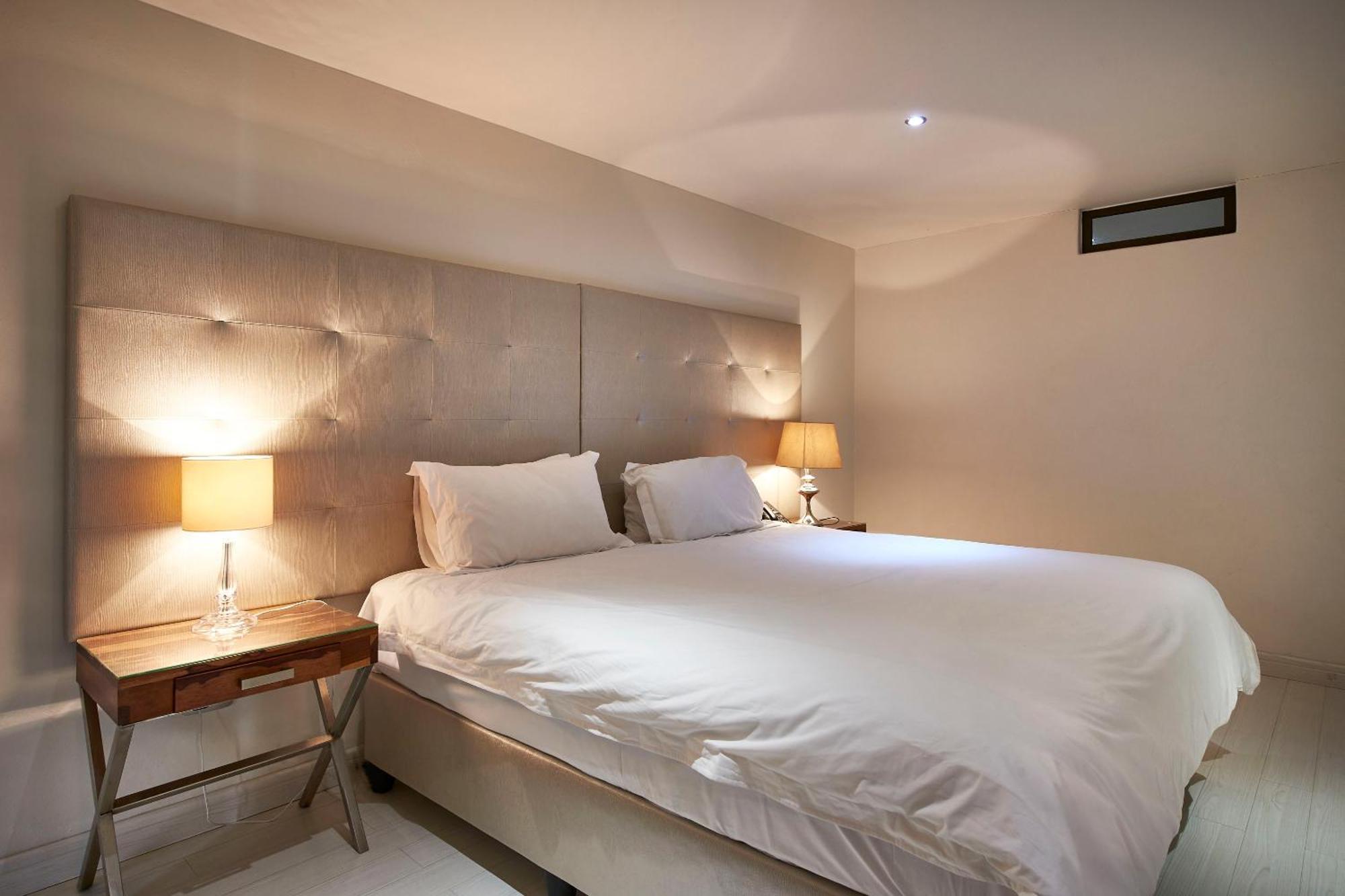 Dynasty Forest Sandown Serviced Apartments & Self Catering Hotel ヨハネスブルグ 部屋 写真